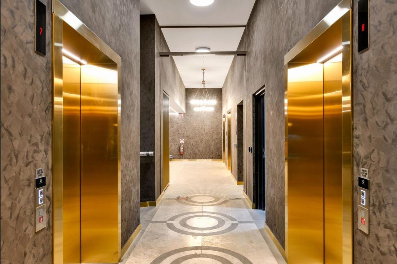 أدليد Realm Apartments By Cllix المظهر الخارجي الصورة